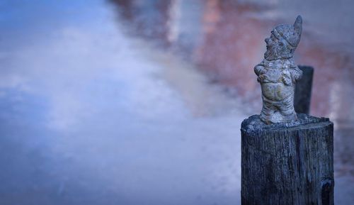 Close-up of statue against sky