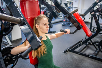 Low section of man exercising in gym