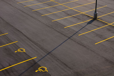 High angle view of disability signs on road