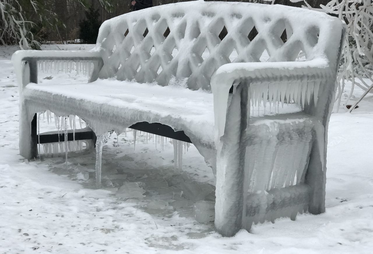 CHAIRS ON SNOW FIELD