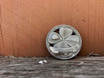 Close-up of clock on table