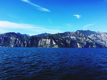 Scenic view of sea against blue sky