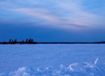 Scenic view of frozen sea against sky