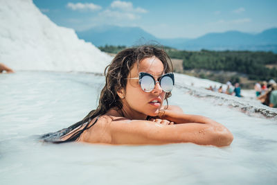 Portrait of young woman on beach