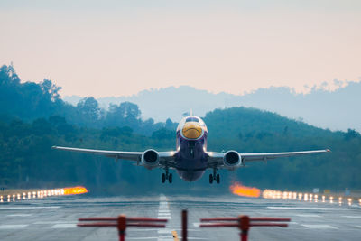 Airplane taking off from runway