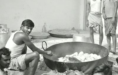 Full length of man preparing food