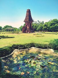 Stone structure in park against clear sky