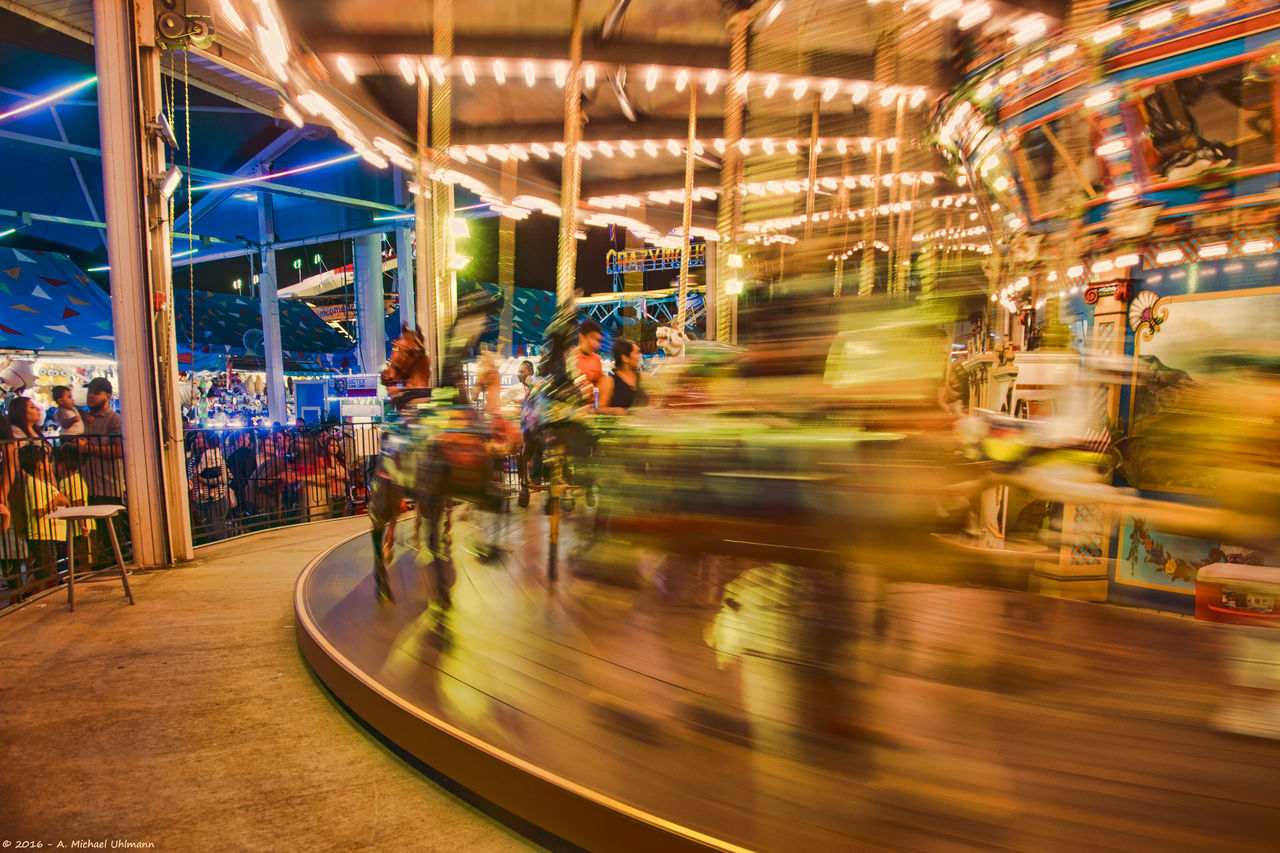 ILLUMINATED FERRIS WHEEL AT NIGHT