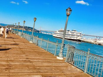 Pier over sea against sky