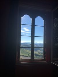 View of landscape seen through window