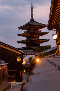 Low angle view of illuminated buildings in city