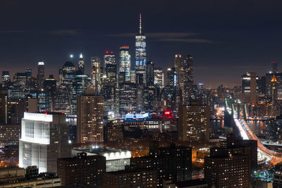 Illuminated buildings in city at night