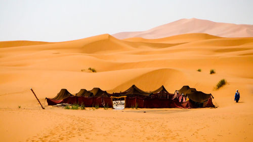 Scenic view of desert against clear sky