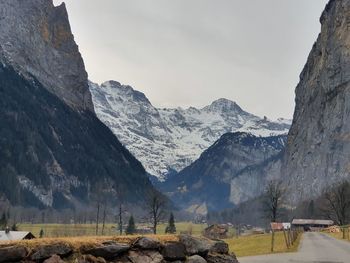 Scenic view of snowcapped mountains against sky