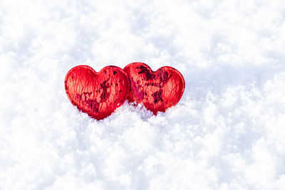 Directly above shot of red heart shape against sky