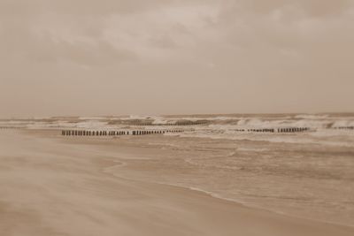 Scenic view of beach against sky