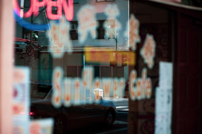 Blurred motion of glass window in restaurant