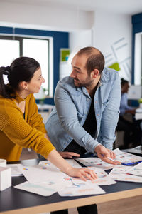 Business colleagues discussing at office