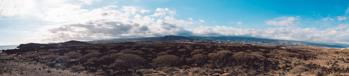 Panoramic view of volcanic landscape against sky