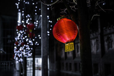 Close-up of illuminated lantern hanging at night