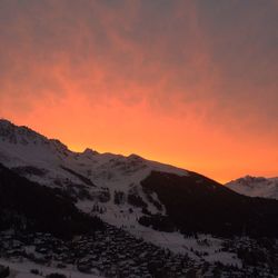 Scenic view of mountains against sky during sunset