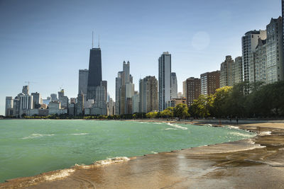 View of city buildings at waterfront