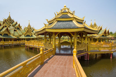 Temple outside building against clear sky