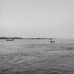 Boat sailing in sea