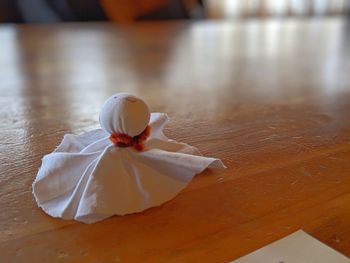 High angle view of shell on white table