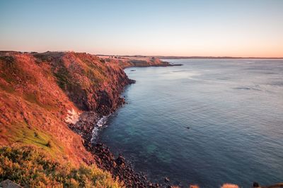 High angle view of sea against sky during sunset