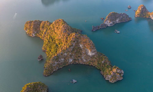 High angle view of rock formation in sea