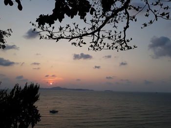 Scenic view of sea against sky at sunset