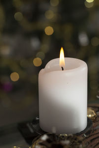 Close-up of burning candle