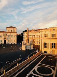 High angle view of obelisk palazzo del quirinale in city against sky