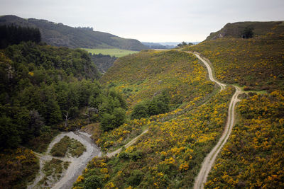 Scenic view of mountain road against sky