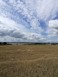 Scenic view of field against sky