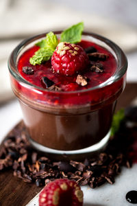 Close-up of strawberries in glass on table