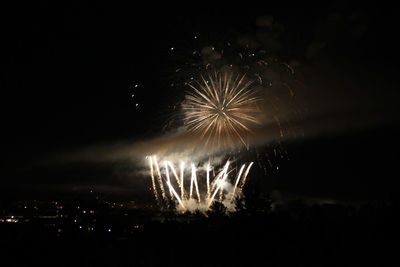 Low angle view of firework display