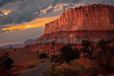 Scenic view of mountain against cloudy sky