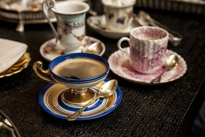 High angle view of coffee served on table