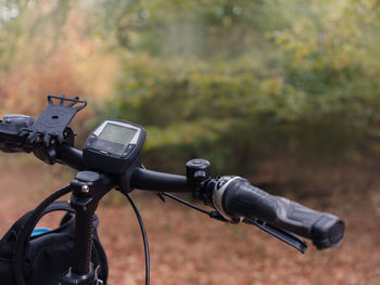 Close-up of bicycle on field