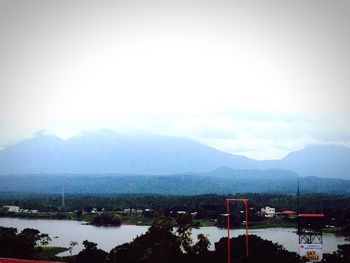 View of cityscape with mountain range in background