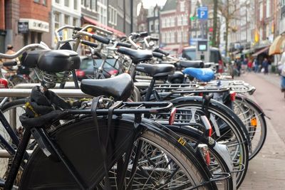 Bicycles parked on street in city