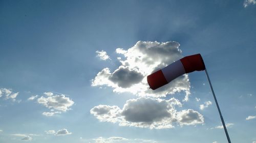 Low angle view of flag against sky