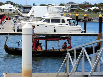 View of boats moored at harbor