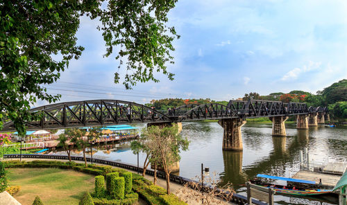 Bridge over river against sky