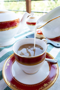 Close-up of coffee cup on table