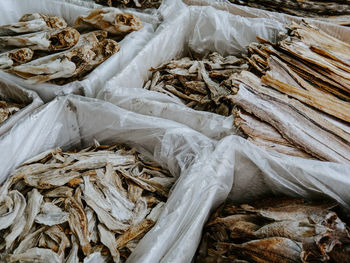 High angle view of dried fishes for sale at market