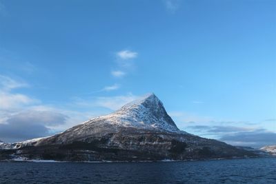 Scenic view of sea against blue sky