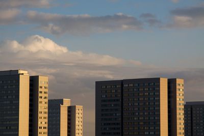 Modern cityscape against sky